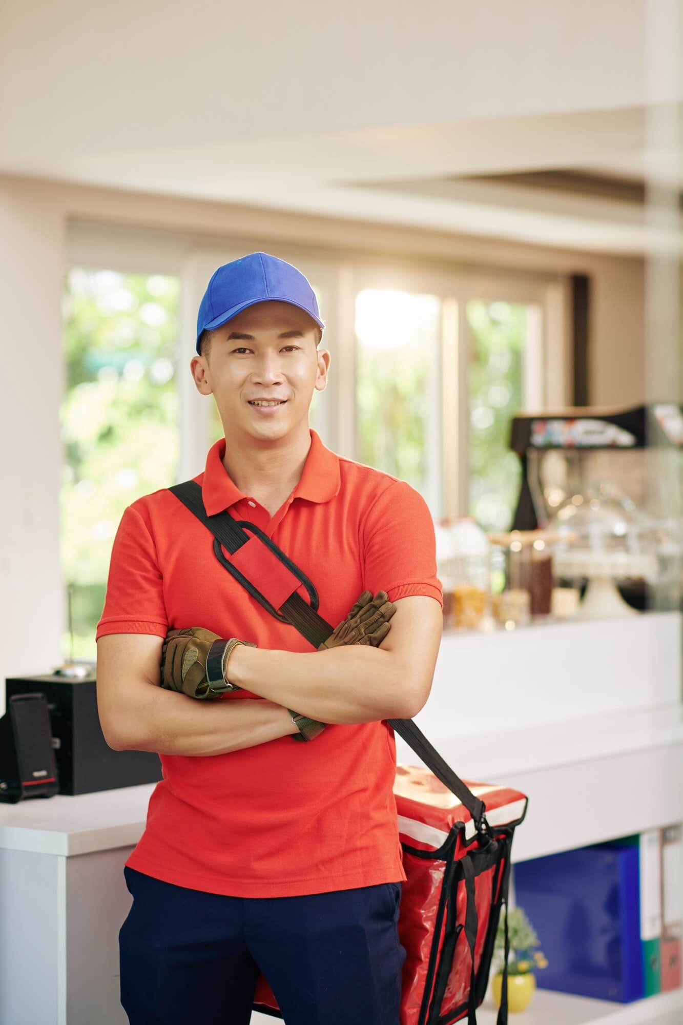 courier-standing-in-cafe-1.jpg